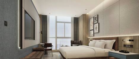 A modern hotel room with a large bed, a desk, a bench, and a view of the city.