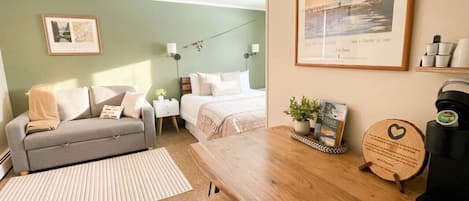 1 bedroom, desk, iron/ironing board, travel crib