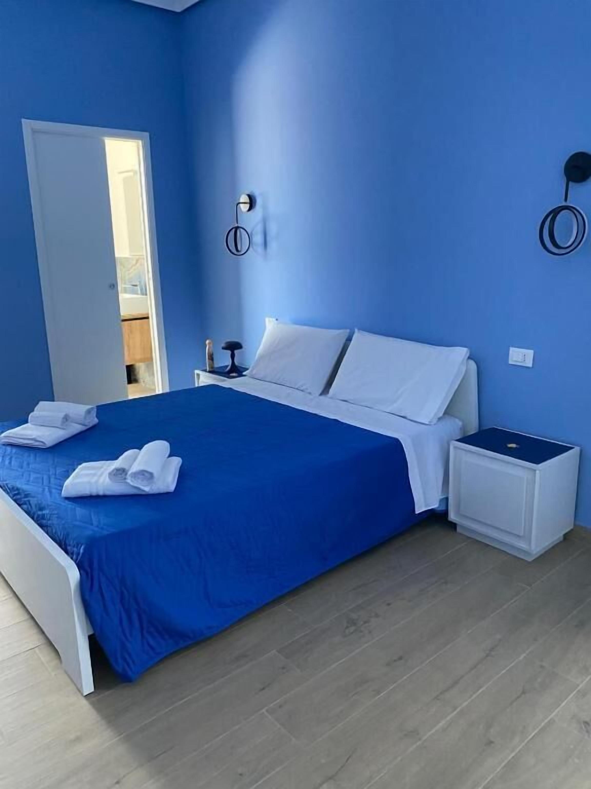 Quarto casal luxo, sacada, vista para a cidade