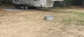27 foot fifth wheel on a small private campground.  Pets allowed.