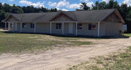27 foot fifth wheel on a small private campground. Pets allowed.