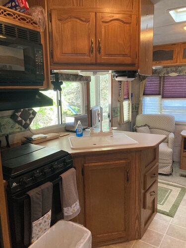 27 foot fifth wheel on a small private campground.  Pets allowed.