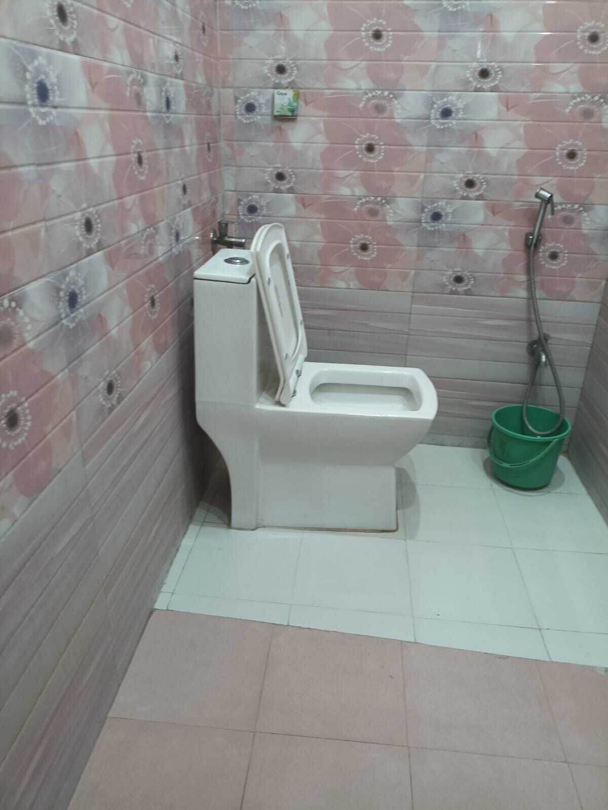 Shower, towels, soap, toilet paper