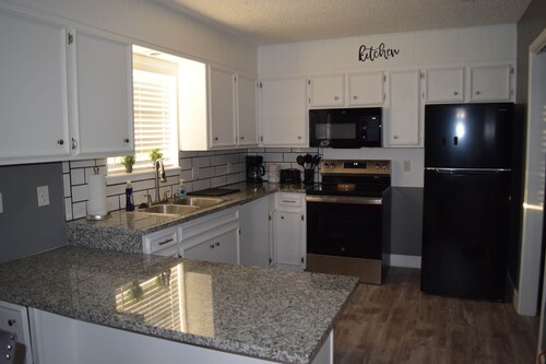 Centrally located home away from home w/quick access to food, drinks, and fun!