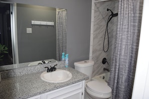 Hair dryer, towels, soap, shampoo