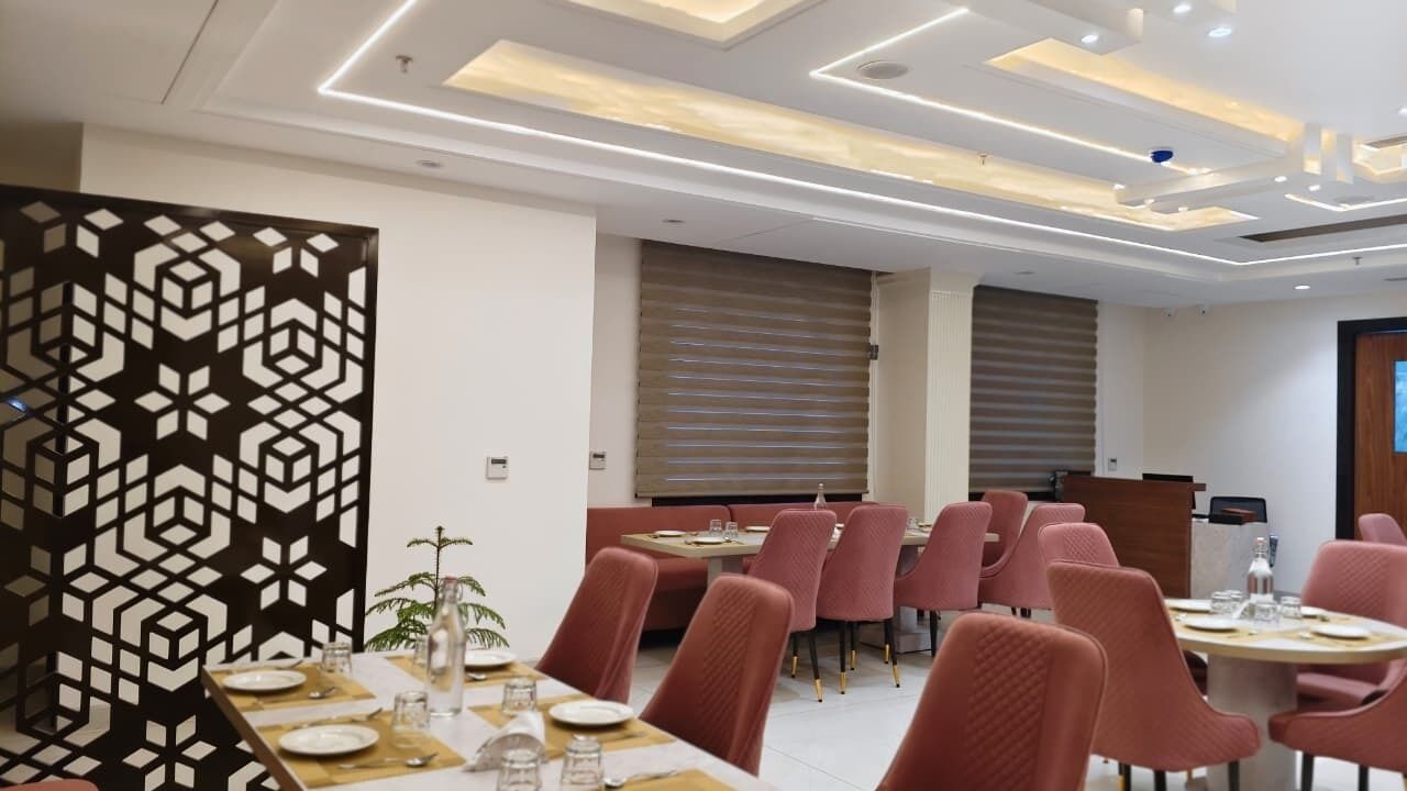 Dobbelt- eller tomannsrom, byutsikt | Spiseområde