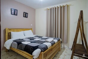 2 habitaciones, tabla de planchar con plancha, wifi y ropa de cama