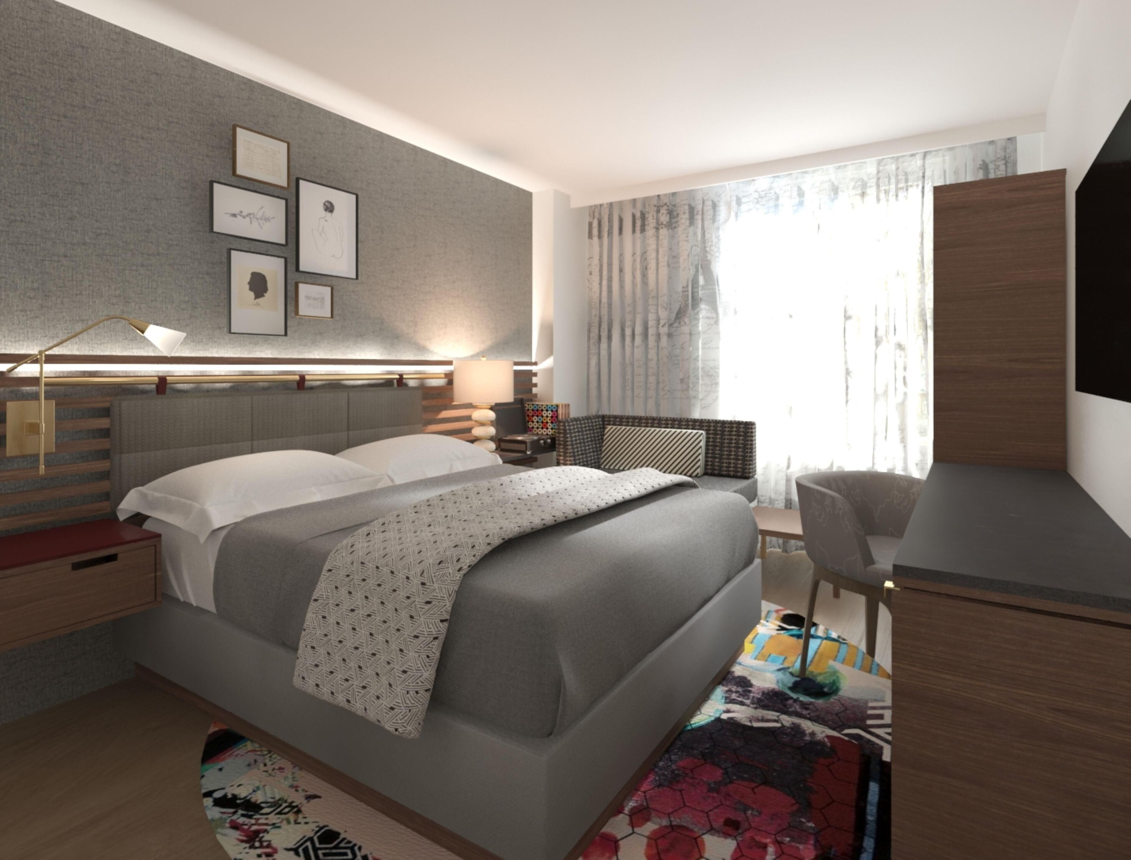 Ein modernes Schlafzimmer mit einem Bett, einem Nachttisch, einer Lampe und einem Schreibtisch mit Stuhl.