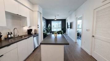 Coffee/tea maker, fridge, microwave, oven