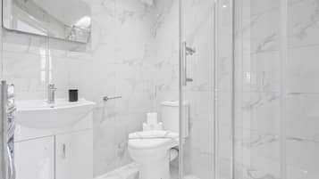 Hair dryer, towels, soap, toilet paper