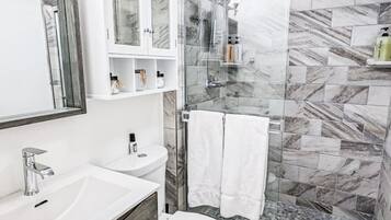 Hair dryer, towels, soap, shampoo