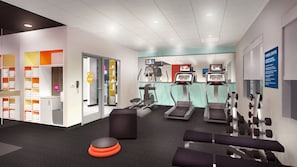 A fitness center with treadmills, exercise bikes, and free weights. - Tru by Hilton Austin University Capitol District (Austin)