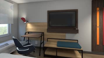 A modern room with a bed, a desk, a chair, and a TV mounted on the wall.
