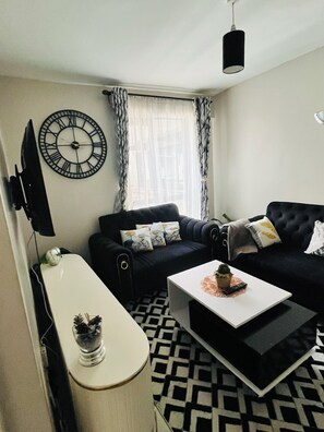 Living area - Cozy 1 bedroom Apartment - Royal Suburbs by Tsavo (Nairobi)