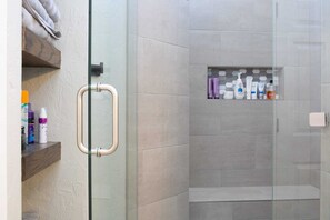 Shower, hair dryer, towels, soap