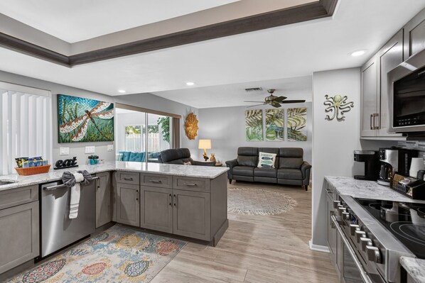 Fridge, microwave, oven, stovetop - Summer Deals! 3/2 Pool Home NW Bradenton 10 mins to Beach! (Bradenton)