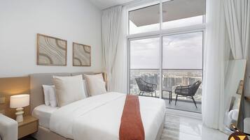 Luxe studio, balkon, uitzicht op stad