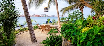 Villa Ipomée and its waterfront tropical garden on Ngor Island