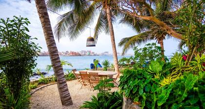 Villa Ipomée and its waterfront tropical garden on Ngor Island