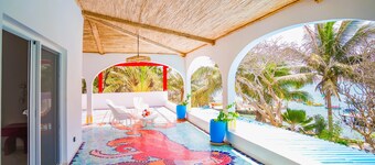 Villa Ipomée and its waterfront tropical garden on Ngor Island