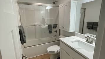 Hair dryer, towels, soap, toilet paper