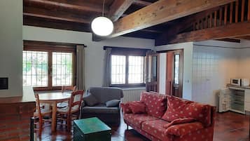 Appartement, uitzicht op tuin | Woonruimte