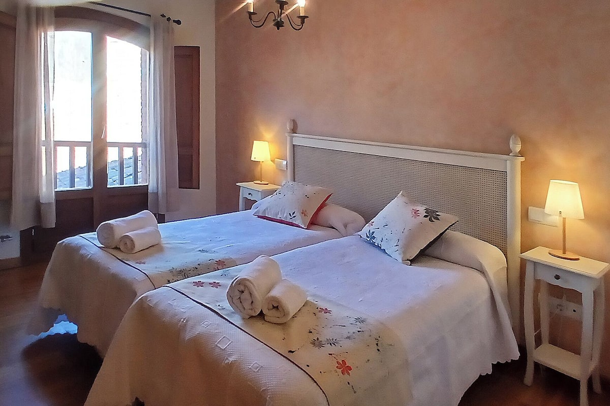 Quarto duplo, vista para a montanha