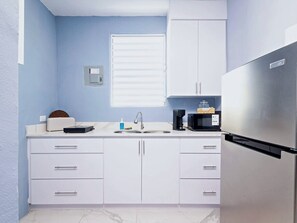 Fridge, microwave, stovetop, coffee/tea maker - Comfortable San Juan Home • Ideal for Groups + Parking (San Juan)