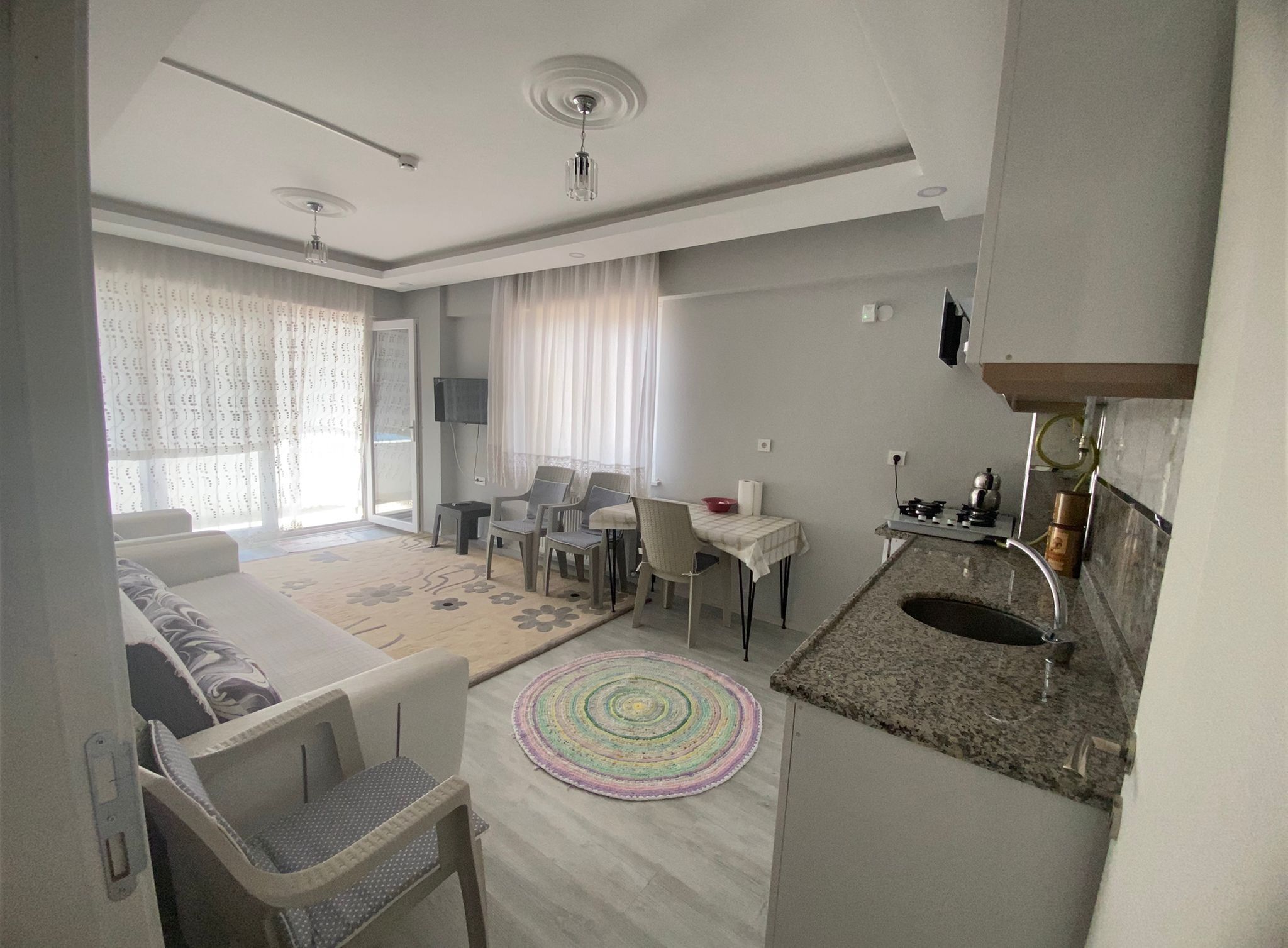 Standard Apartment, Multiple Beds, Balcony, Sea View | Living area