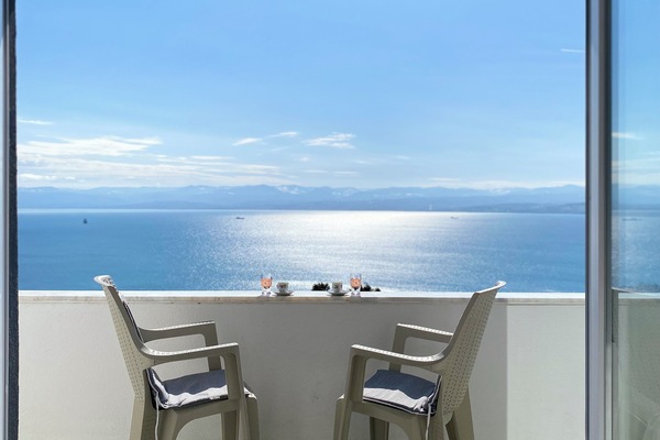 Standard Apartment, Multiple Beds, Balcony, Sea View | Premium bedding, minibar, desk, laptop workspace