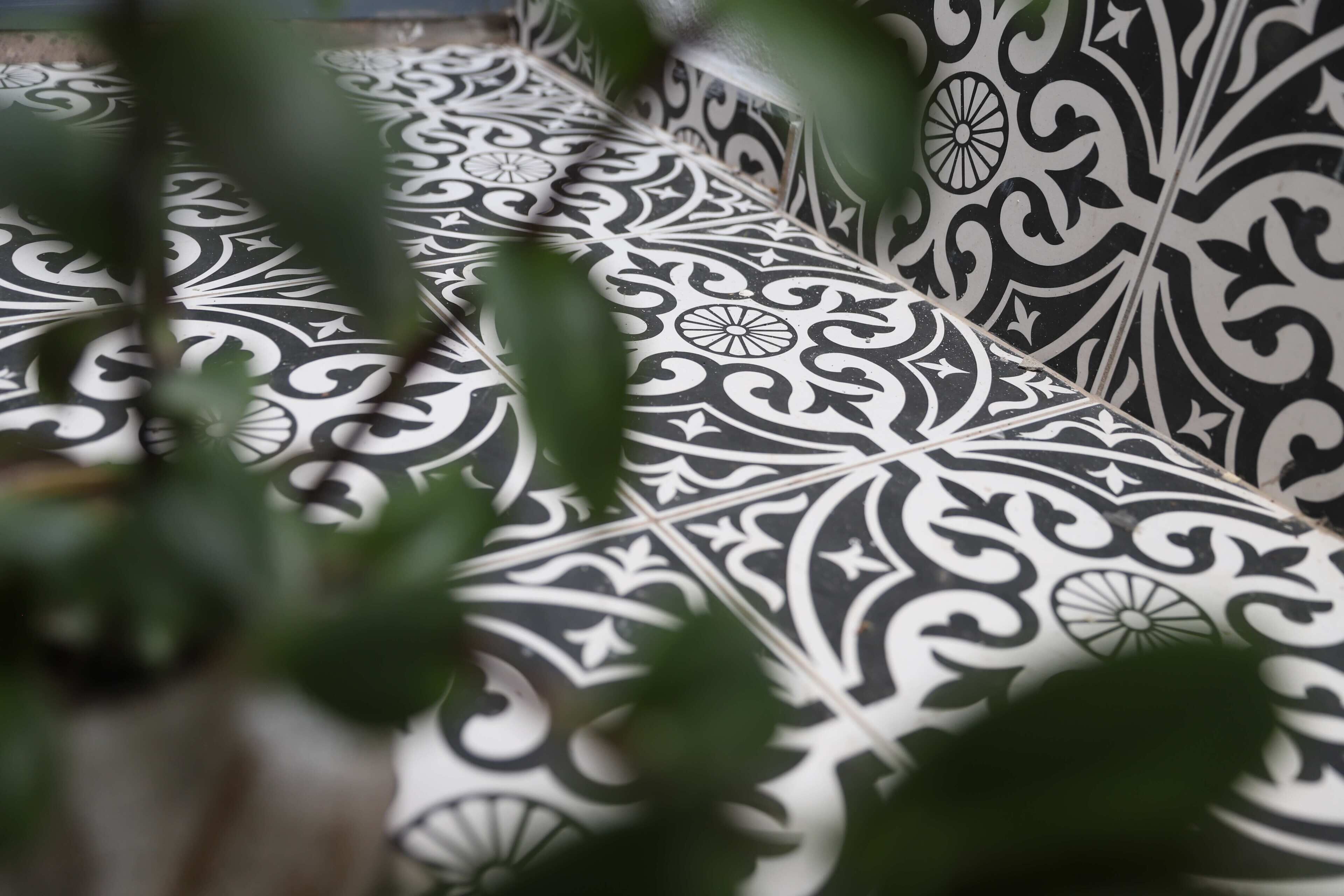 A patterned floor with a geometric design.