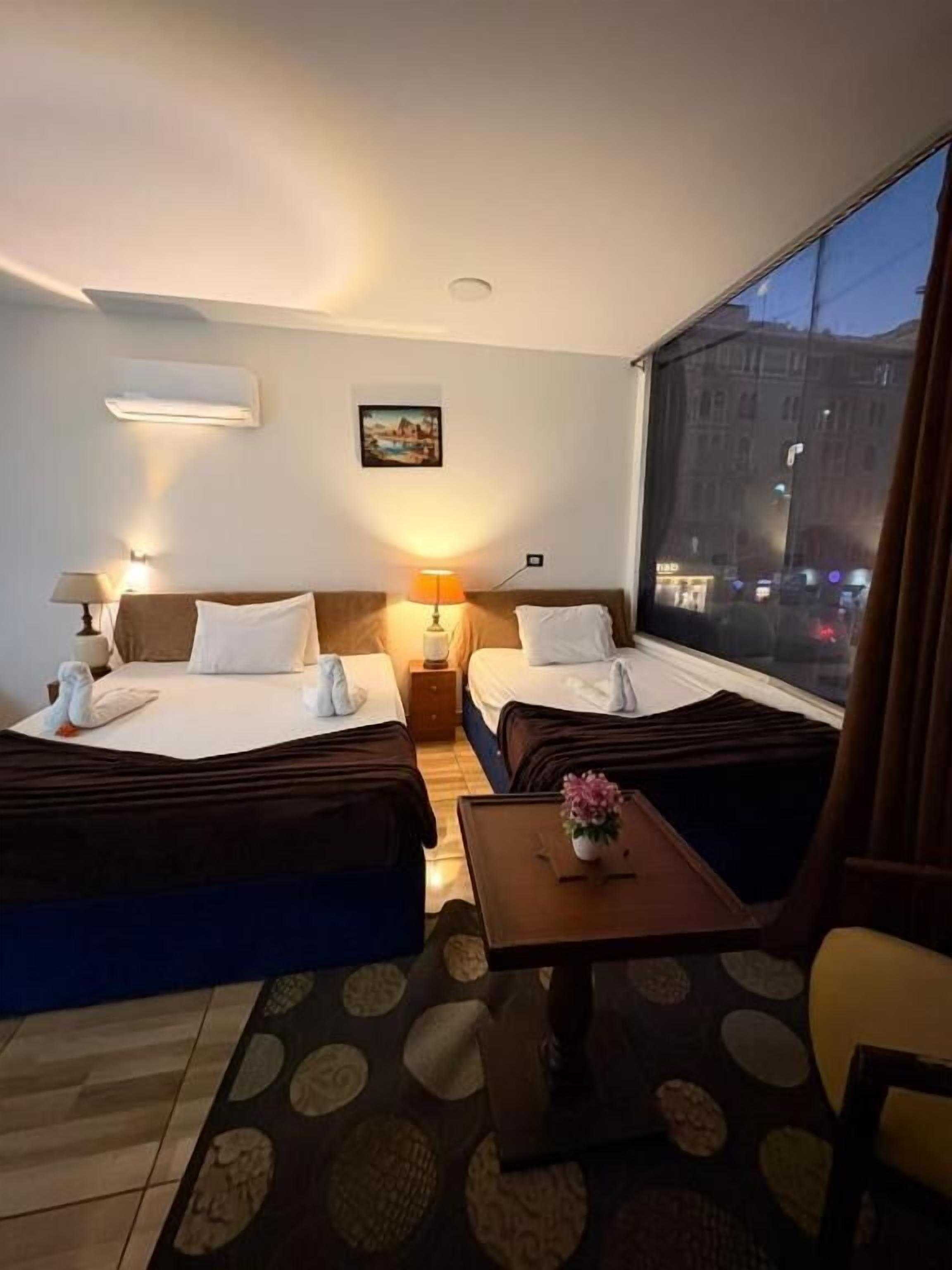 Quarto quádruplo superior, vista para a cidade