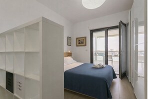 1 habitación, tabla de planchar con plancha, wifi gratis y ropa de cama 