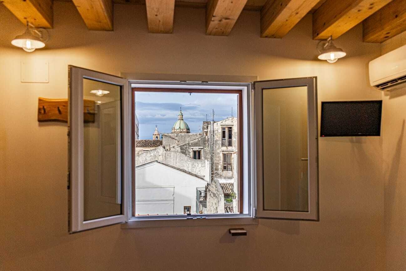 Quadruple Room, City View | Interior