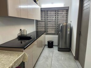 Room, 2 Bedrooms, Smoking, Terrace | Private kitchen - Room-amruthadhara A Home of Timeless P (Thiruvananthapuram)