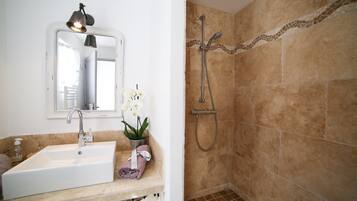 Shower, hair dryer, towels, soap