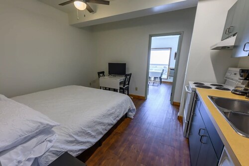 Resort room with two beds and a full kitchen and hottub access