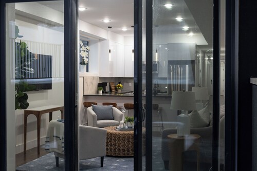 Modern Condo with Outdoor Patio, Parking space, and access to NYC!