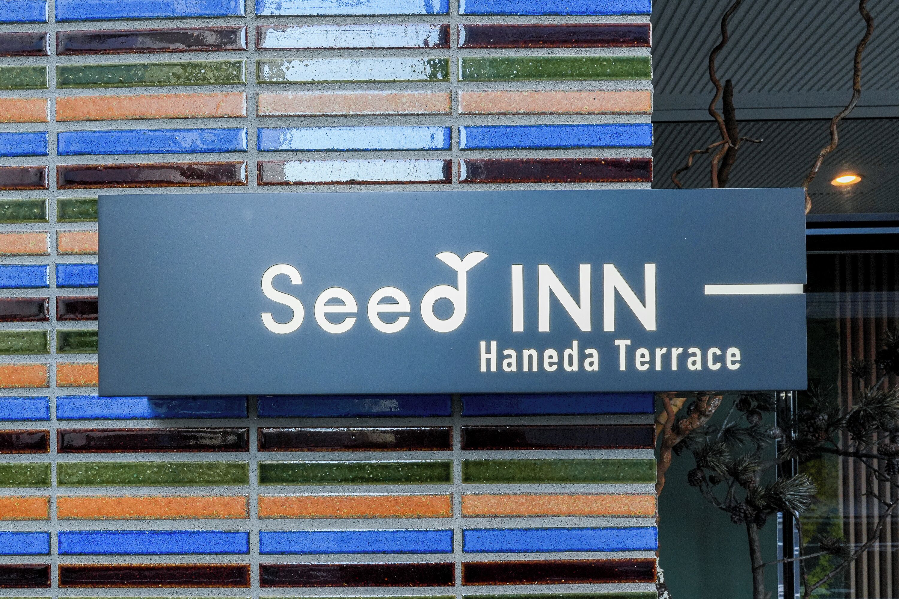 Placa para Seed Inn no Haneda Terrace.