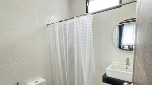 A bathroom with a toilet, a sink, and a shower curtain. - The Star Aonang Private Pool Villa -  Aonang Krabi with 2 bedrooms (Mueang Krabi)