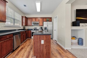 Private kitchen - 3-bedroom townhome in pleasant Lawrenceville with AC for relaxing stays (Lawrenceville)