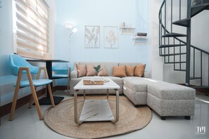 Deluxe Studio, Kitchen | Living area - Woodlands Condotel (Bulan)