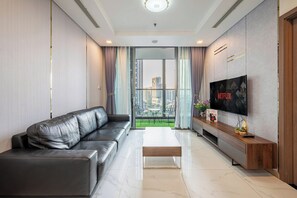 Deluxe Apartment, 2 Bedrooms, Balcony, City View | Living area - LANDMARK 81 Signature Residence (Binh Thanh)