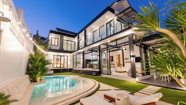 A modern two-story house with a swimming pool, outdoor seating, and a well-maintained lawn. - Villa Bali Escape– Private Ricefield Retreat, Steps from the Canggu Action (Canggu)