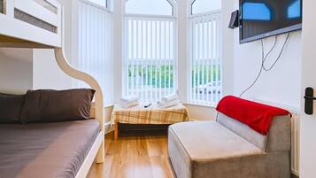 Habitación Deluxe, baño privado, vista al jardín