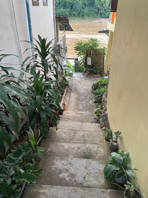 Basic Shared Dormitory, Lanai, River View | Property grounds - Mekong Backpackers Hostel  (Pakbeng)