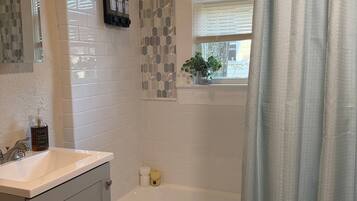 Hair dryer, towels, soap, shampoo