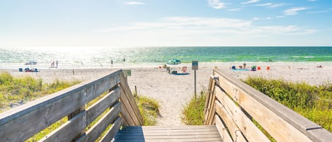 On the beach, sun-loungers, beach towels
