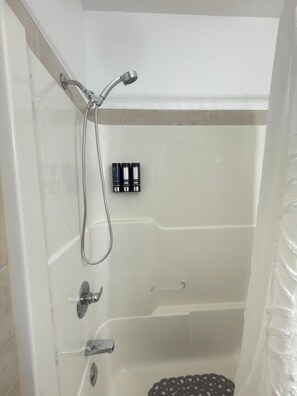 Hair dryer, towels, soap, toilet paper - The Boho-Chic Urban Retreat: 3BR Haven Near Downtown & General Hospital (Regina)