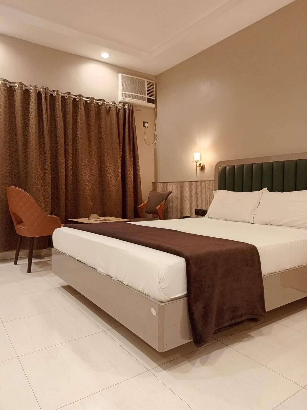 Deluxe-huone, näköala puutarhaan